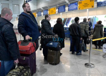 Таяқтың ек ұшы бар: Қазақстанға келген 400 мың Ресей азаматтарының 40 мыңы Қазақстан құжатын алды